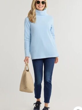 Dudley Stephen’s light blue and cream Cobble Hill Turtleneck fleeces